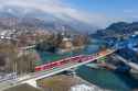 RhB_Ge_4-4_I_with_freight_and_ABe_4-16_as_S-Bahn_at_Reichenau-Tamins