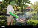 a-man-grilling-BWF95B