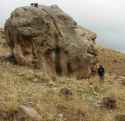 Giant Mudfossil Head with Normal Human for Comparison