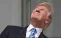 trump looking at sun like a total retard dumbass faggot bitch